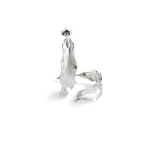 Silver Flame lily petal earrings on white background