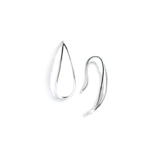 Silver loop earrings on white background