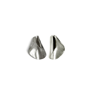 Silver Pod studs on white background