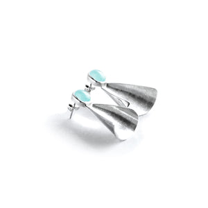 Silver stud earrings with smooth light aqua blue gemstones