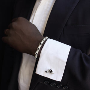 Man wearing cuff and cufflinks