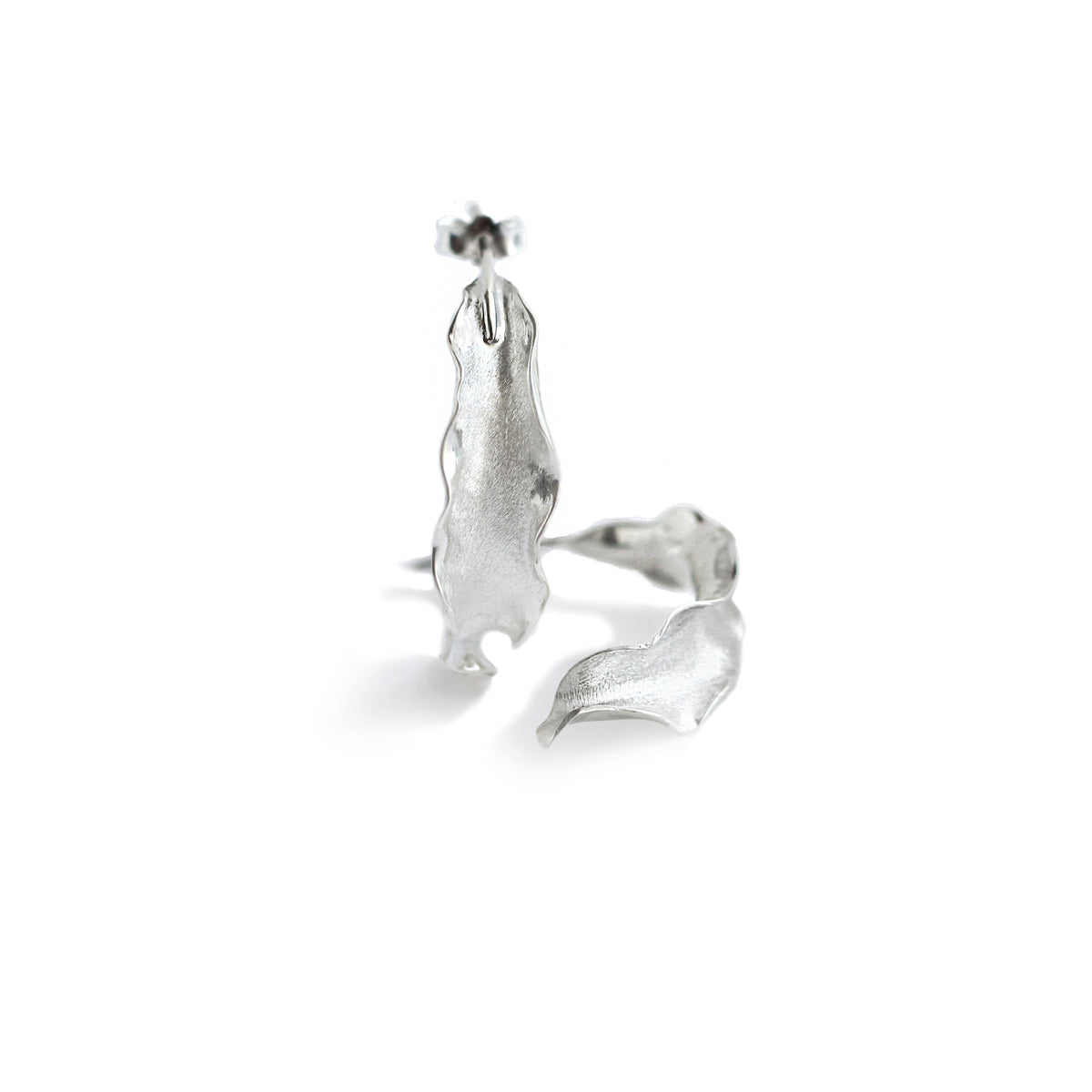 Silver Flame lily petal earrings on white background