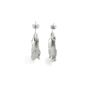 Silver Flame lily petal earrings on white background