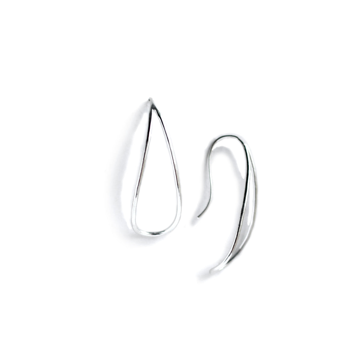 Silver loop earrings on white background