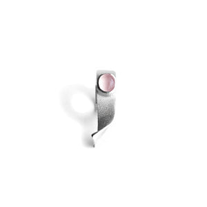 Pirouette Ring with pink gemstone on white background