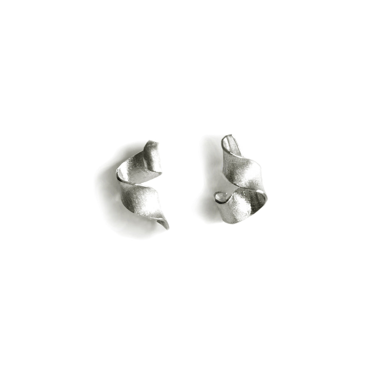 Silver Msasa Stud earrings on white Background