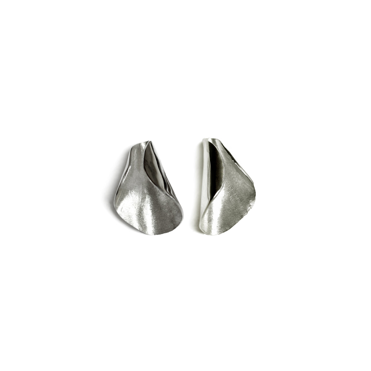 Silver Pod studs on white background