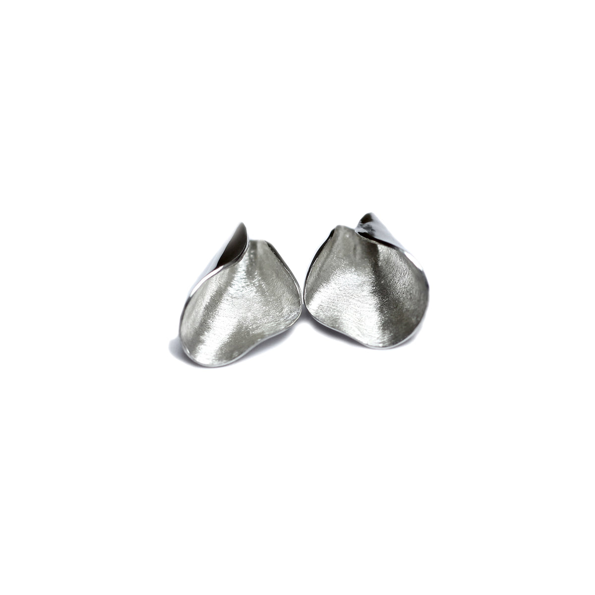 Silver Pod studs on white background